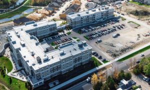 Ariel view of Balmoral Place Retirement Community. A three (3) story seniors residence and apartment building.